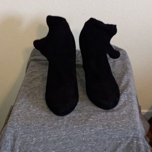 Ankle boots with a scuff mark